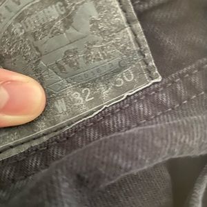 Levi’s 511 distressed denim